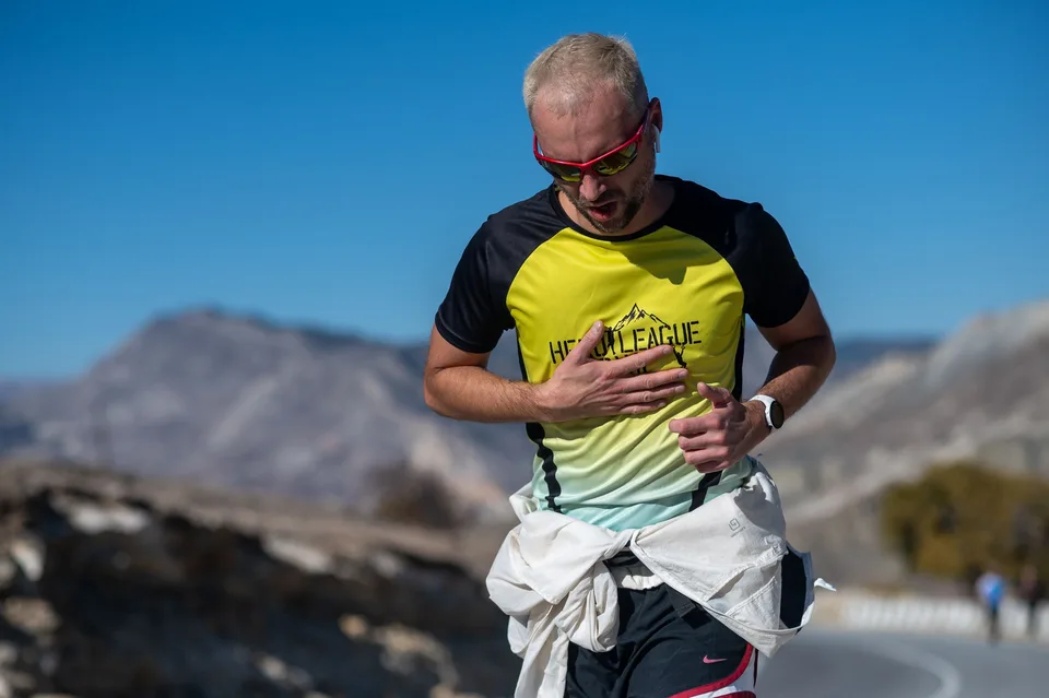 runner on an open road during an outdoor training session