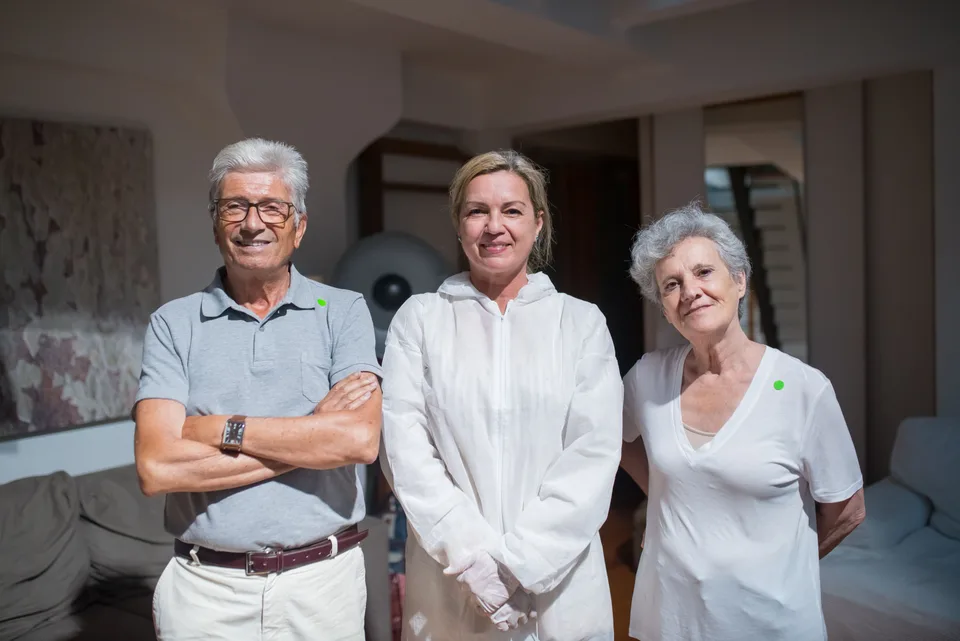 A doctor consulting with patients in a healthcare setting, discussing treatment options.