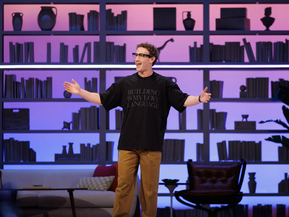 Mark Zuckerberg on stage in front of a lit bookshelf set at Meta Connect 2026