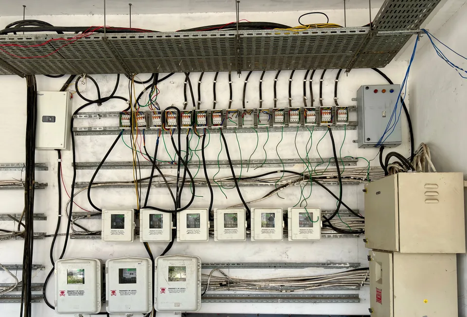 industrial electrical panel filled with wires and switches