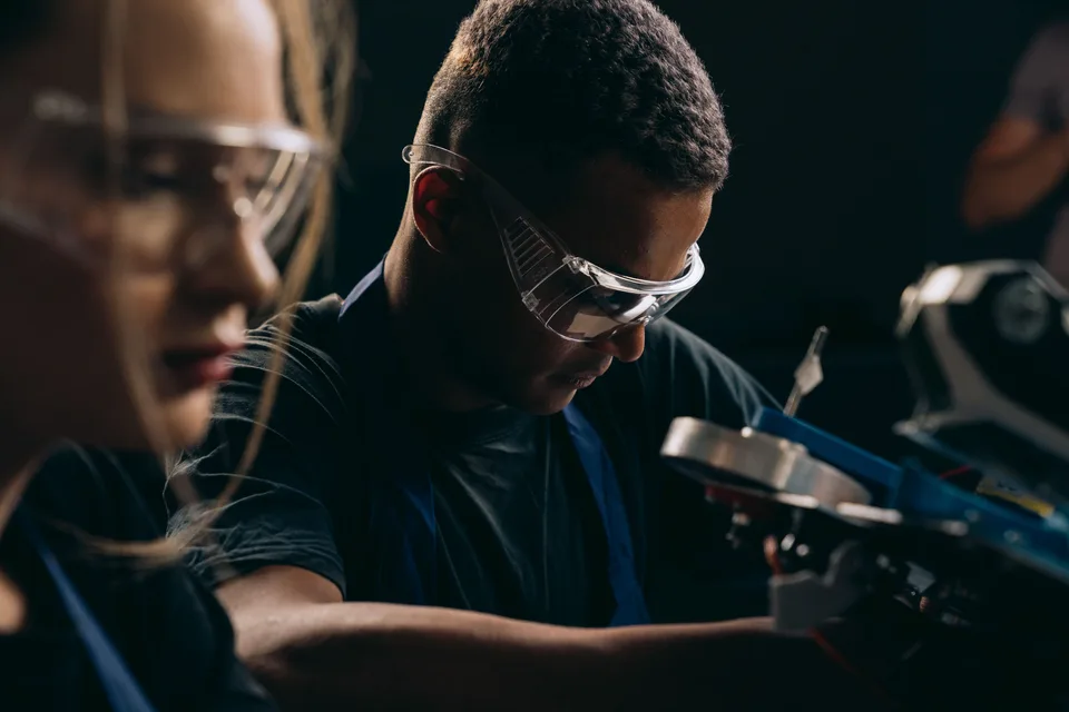 trade worker wearing clear protective safety goggles during hands-on training
